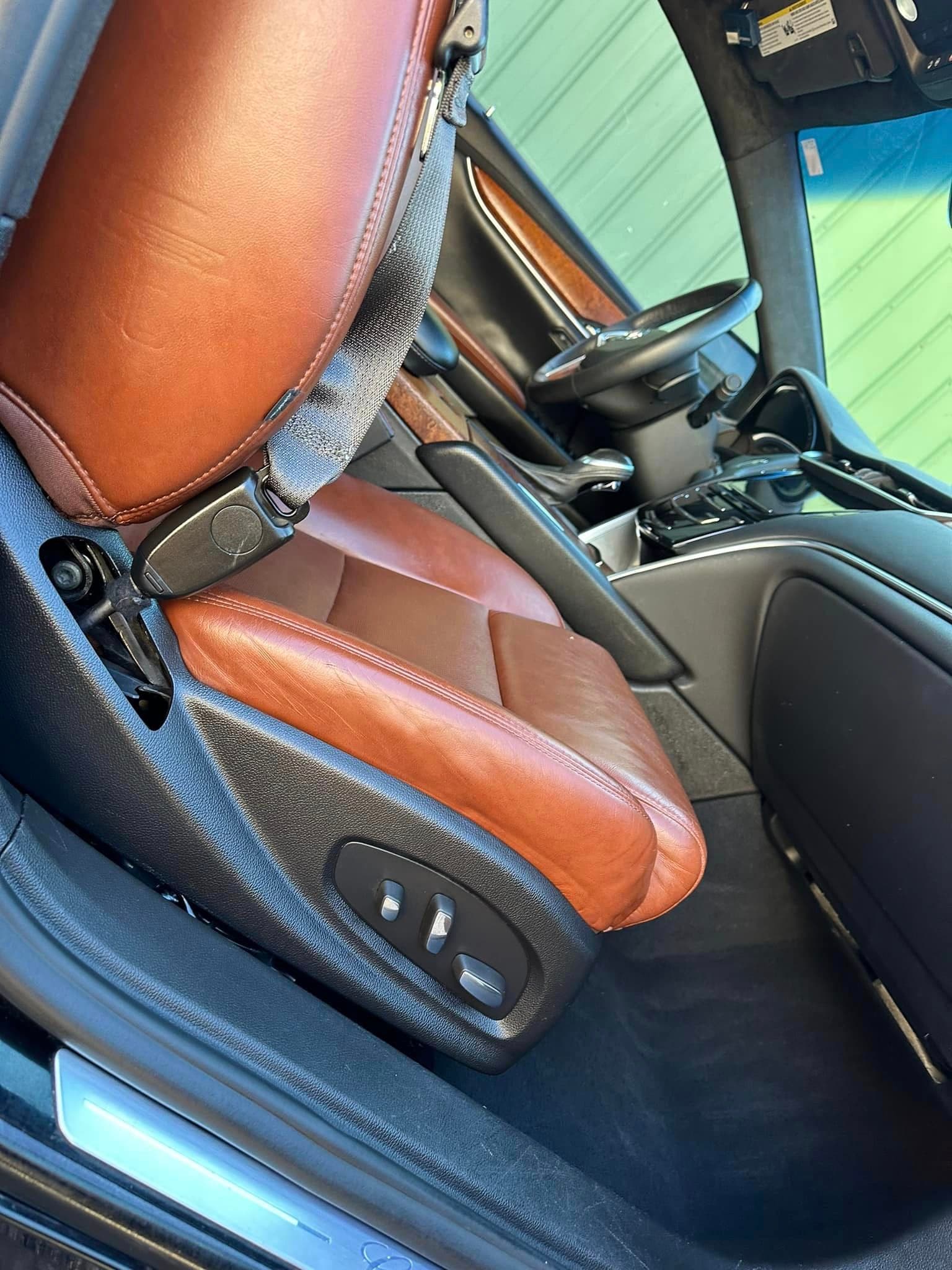 Auto Detailing - Cadillac XTS driver seat - Professional Detailing Wisconsin Dells