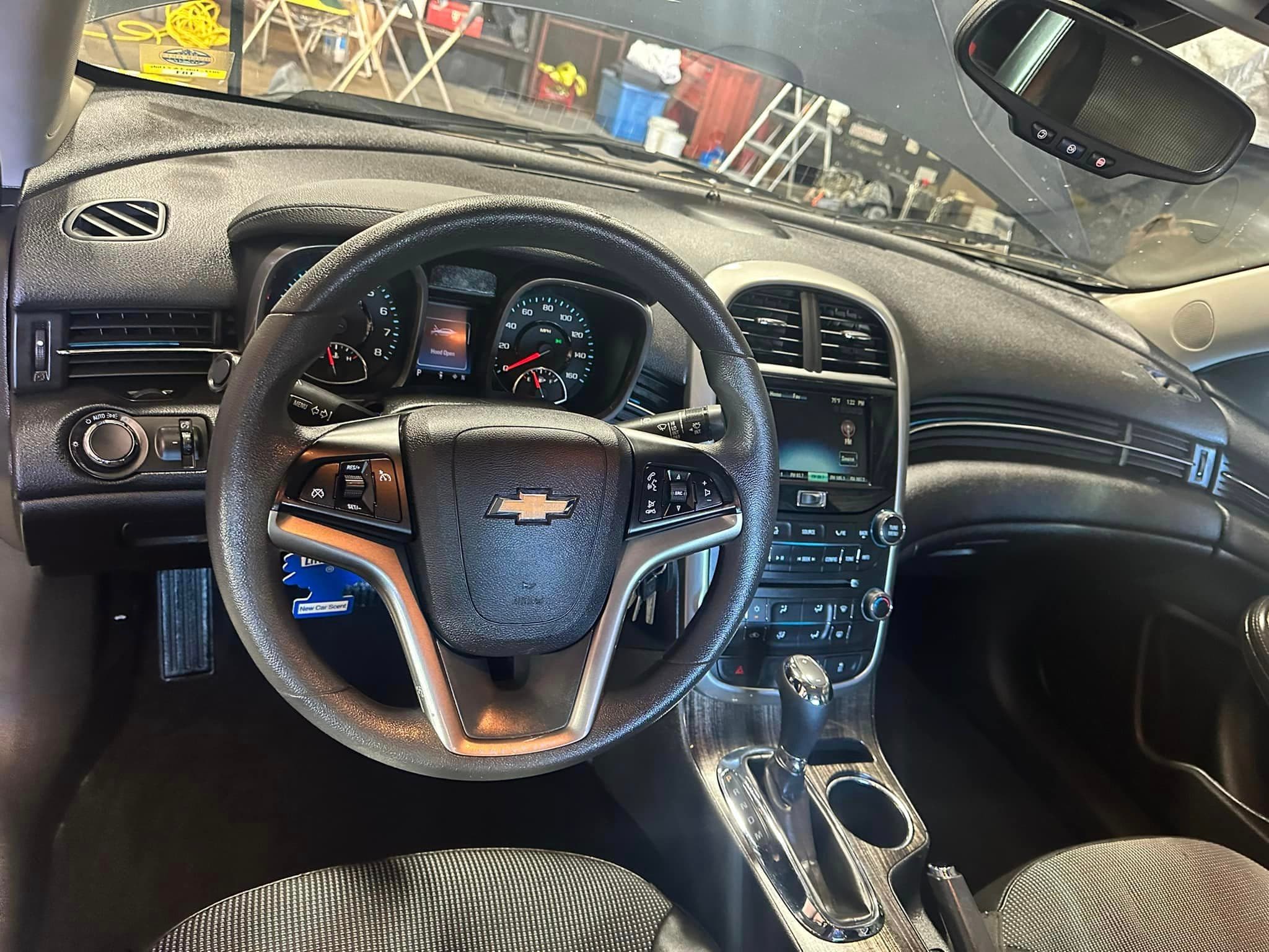 Auto Detailing - Chevrolet Malibu dashboard - Professional Detailing Wisconsin Dells